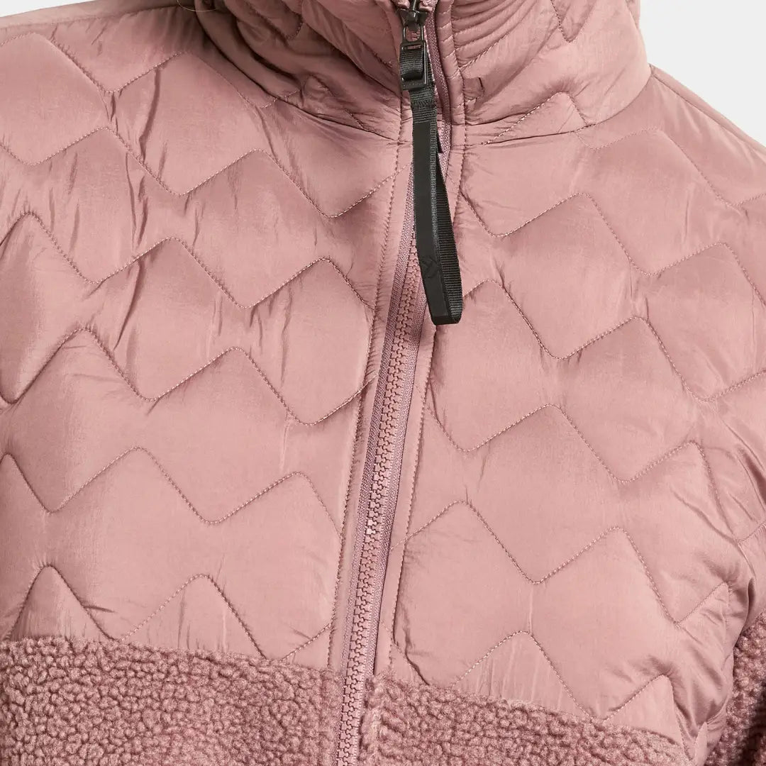 Rose-colored quilted jacket with zip, fuzzy bottom, perfect for country clothing outdoors