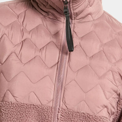 Rose-colored quilted jacket with zip, fuzzy bottom, perfect for country clothing outdoors