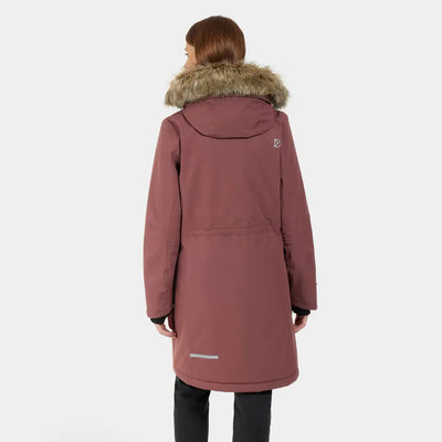 Woman wearing dusty rose Didriksons Erika Womens Parka with fur hood and reflective strip