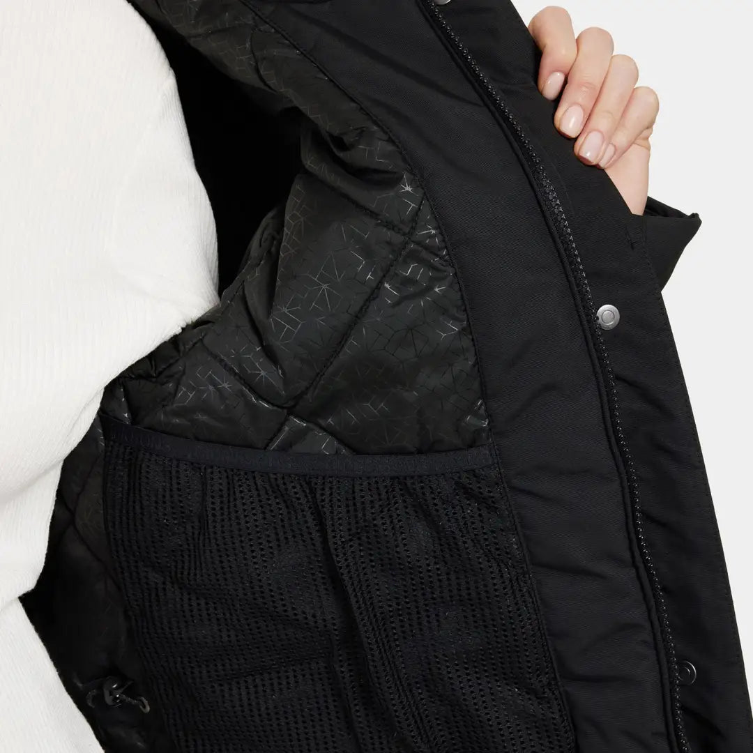 Inside view of Didriksons Frida Womens Parka showing black quilted sporty mid-length parka with mesh pocket