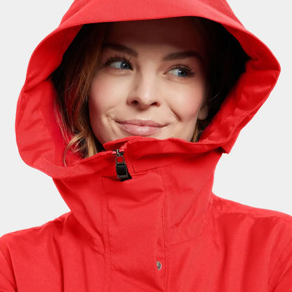 Woman in a red sporty mid-length parka with high collar, Didriksons Frida Womens Parka