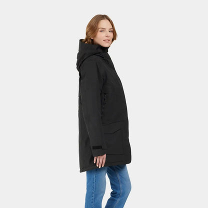 Woman in a black hooded sporty mid-length parka and blue jeans showcasing Didriksons Frida Womens Parka 7