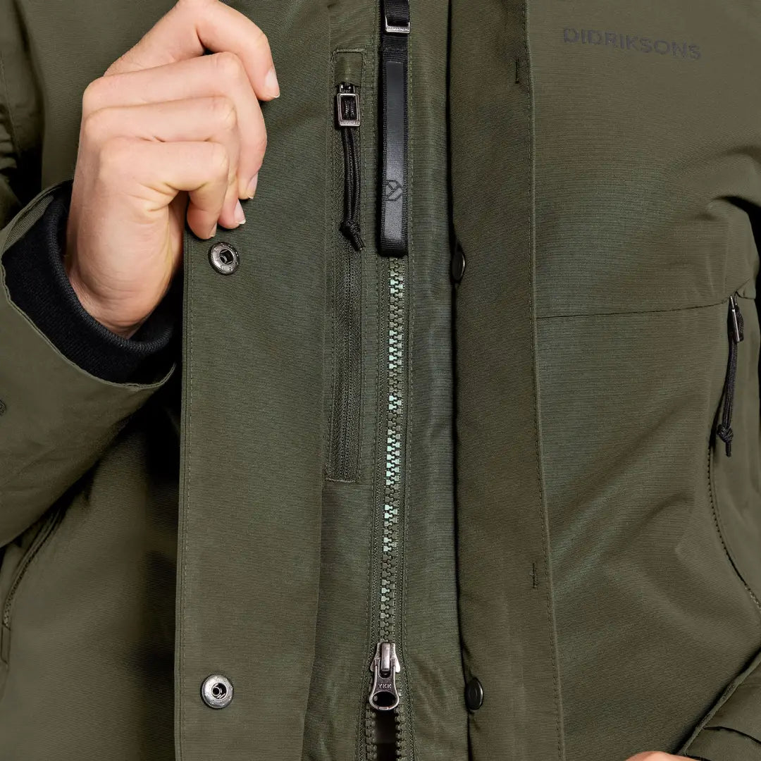 Olive green waterproof sporty mid-length parka with zip and snap front closure