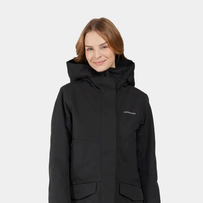 Woman wearing Didriksons Frida Womens Parka 7, sporty mid-length black parka