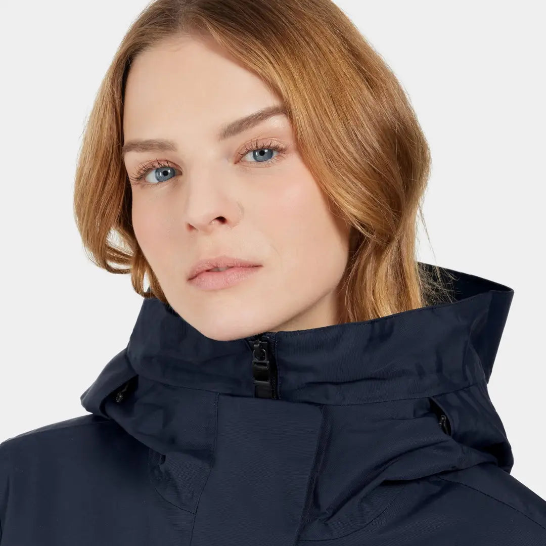 Woman in navy blue hooded sporty mid-length parka for women