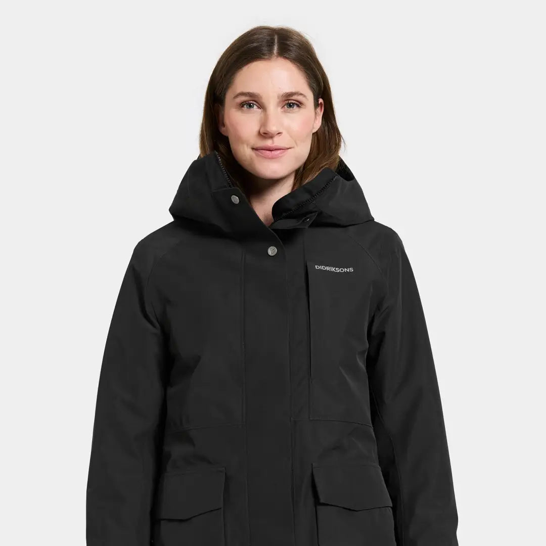 Didriksons Harriet womens parka, black hooded winter jacket with front pockets for country clothing and hunting