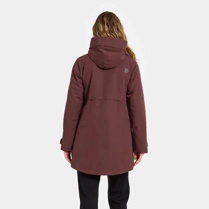 Woman modeling Didriksons Helle Womens Parka in dark red, perfect for country clothing outdoors