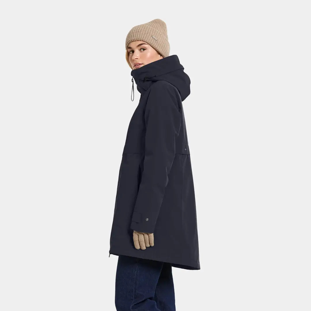 Woman in dark blue Didriksons Helle Womens Parka for country clothing and outdoors