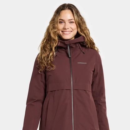 Smiling woman in Didriksons Helle Womens Parka, perfect for country clothing outdoors