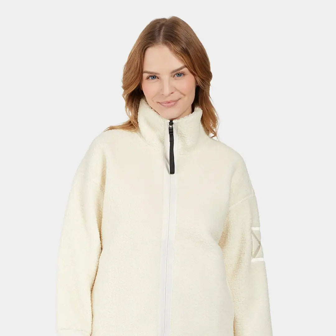 Women’s cream-colored fleece jacket perfect for chilly autumn winds and swirling winter snow
