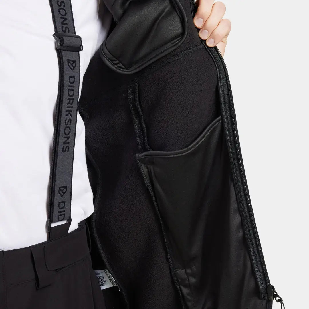 Open Didriksons Phoenix Fleece Jacket showing internal pockets and suspender strap for country clothing and outdoor activities