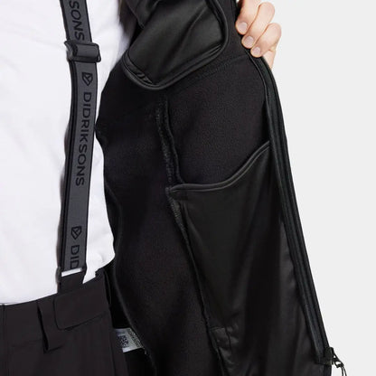Open Didriksons Phoenix Fleece Jacket showing internal pockets and suspender strap for country clothing and outdoor activities