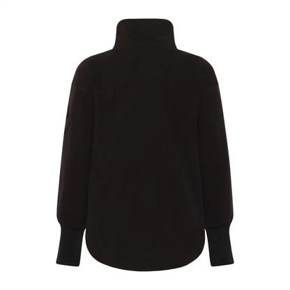 Black long-sleeved turtleneck top with wide ribbed cuffs for country clothing outdoors