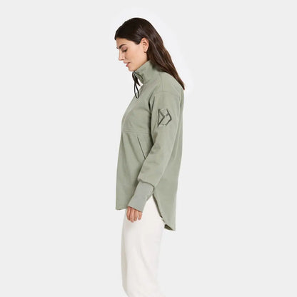 Woman in light green Didriksons Ronja fleece, perfect for country clothing outdoors