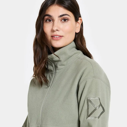 Woman in light green Didriksons Ronja fleece jacket for country clothing and outdoor adventures