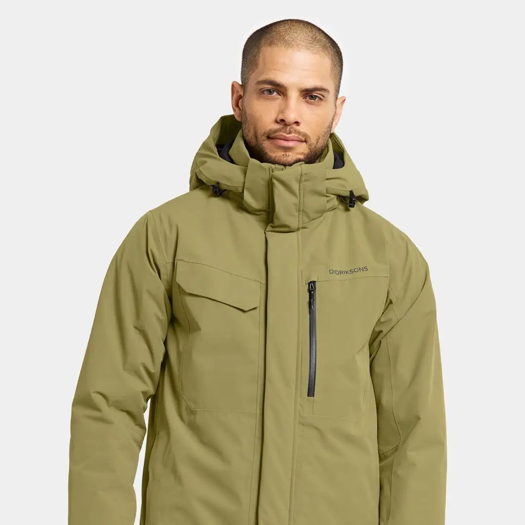 Man in olive green Didriksons Stefan Jacket, perfect everyday winter outerwear