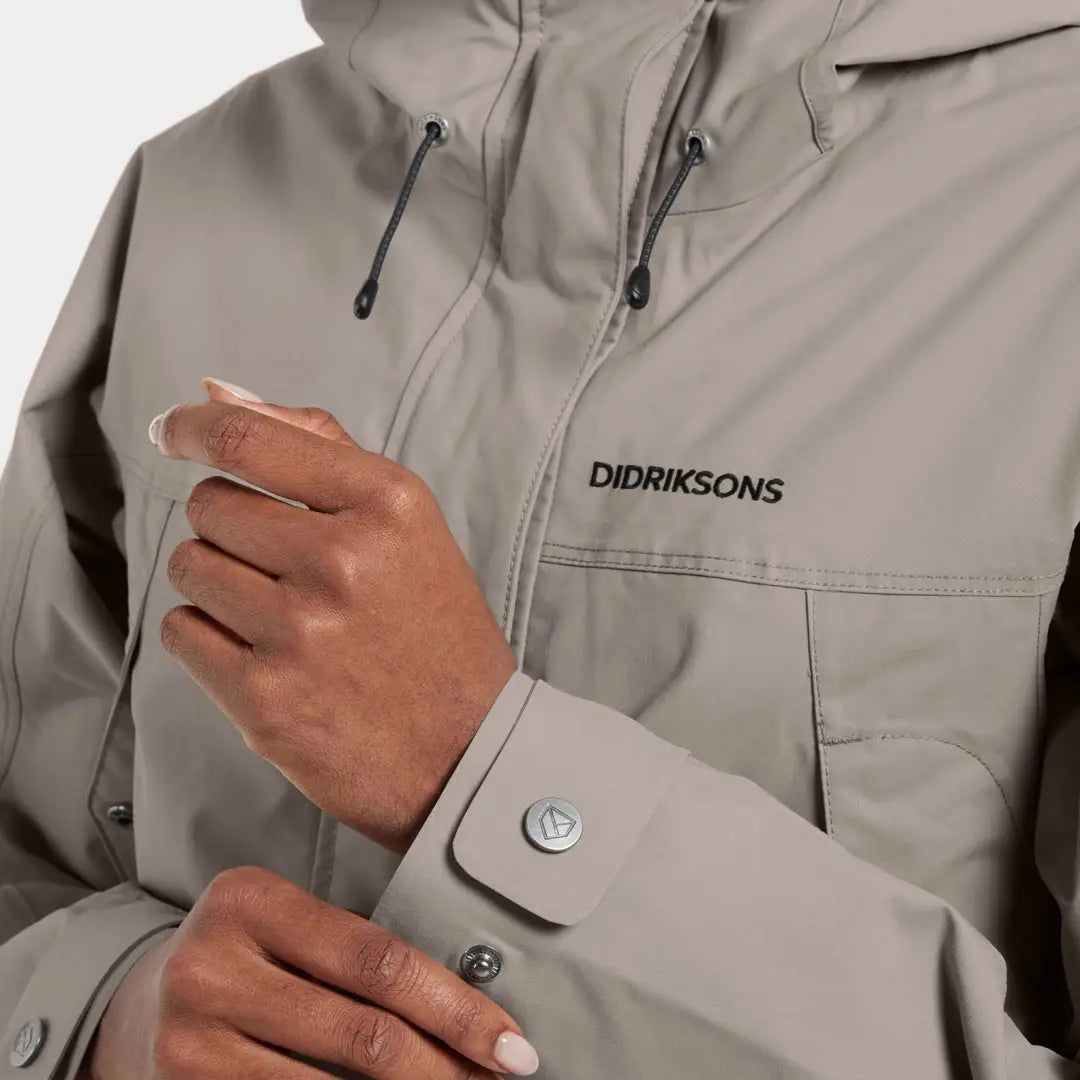 Light brown Didriksons Thelma Womens Parka with snap buttons and hood, iconic Didriksons style