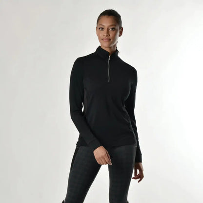 Woman wearing a Black Dublin Kylee Long Sleeve Shirt II quarter-zip pullover sweater