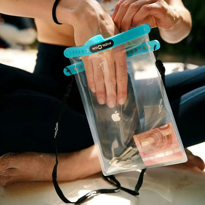 Transparent waterproof Fidlock dry bag with blue closure for ultimate protection