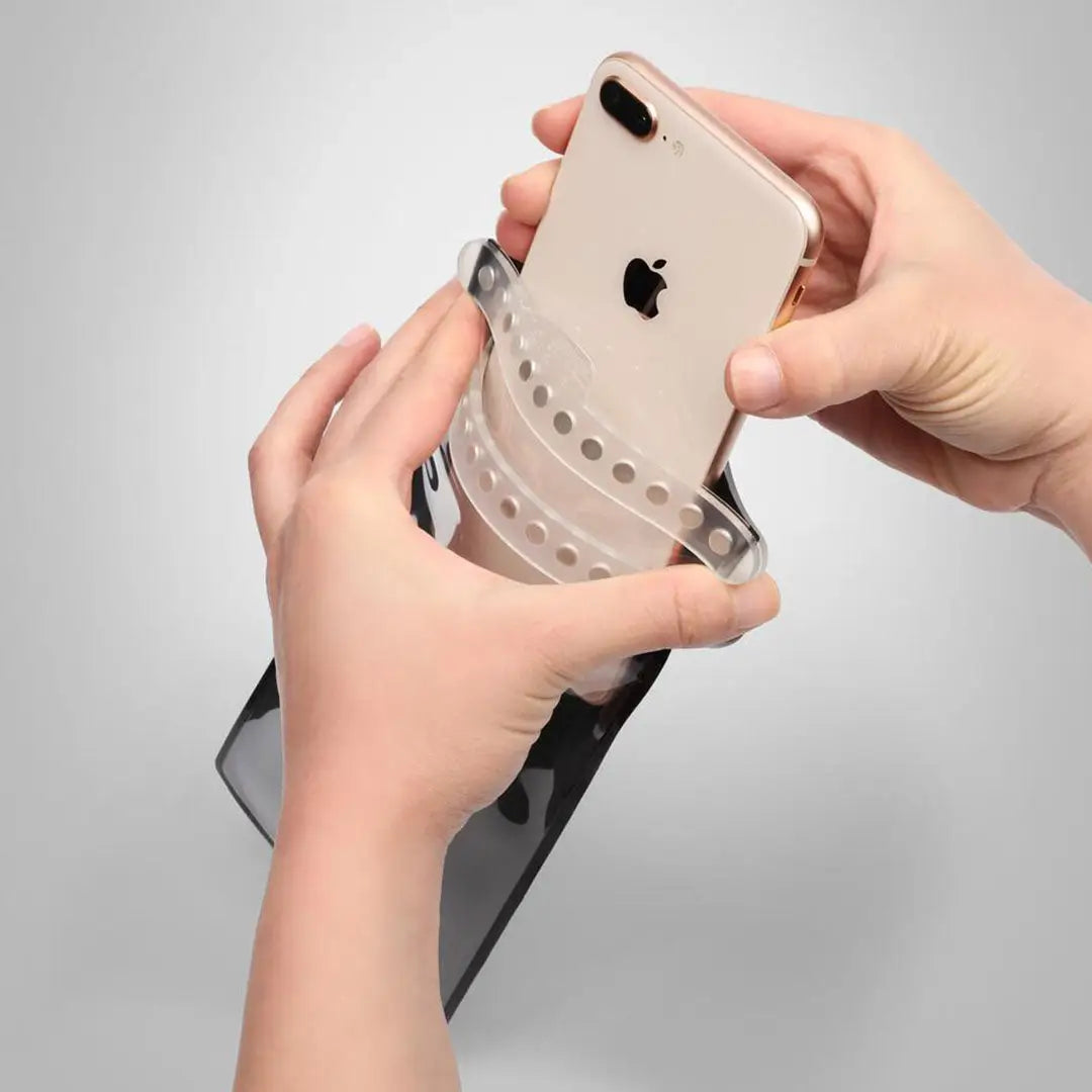 Waterproof Fidlock Medi Dry Bag holding an iPhone, perfect for outdoor adventures