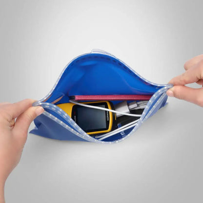 Open blue Fidlock Multi Dry Bag showing off its versatile contents for all your adventures