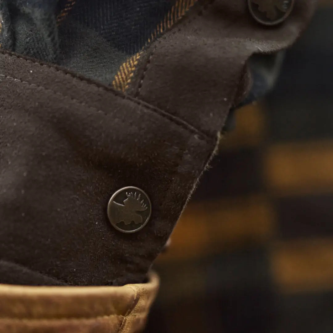 Brown suede cuff with moose press stud on Härkila Aivak Long Sleeve Shirt for hunting country clothing