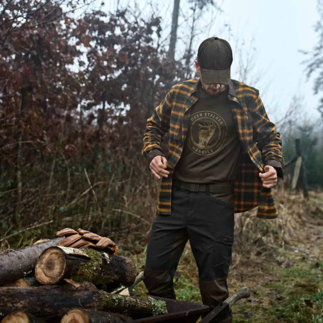 Man wearing Härkila Aivak Long Sleeve Shirt, perfect for country hunting clothing