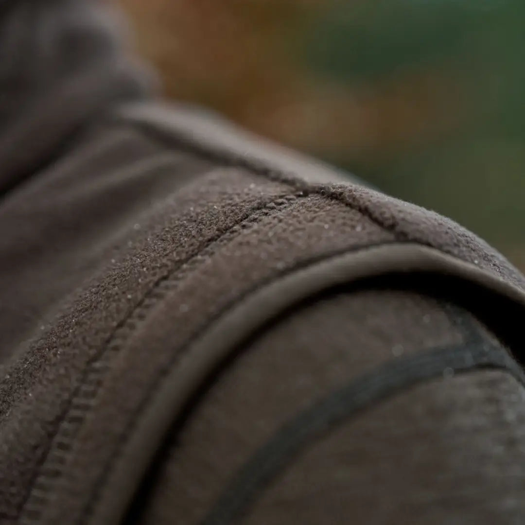 Brown textured shoulder pad on Härkila Aspire Womens Fleece Waistcoat for a rugged look