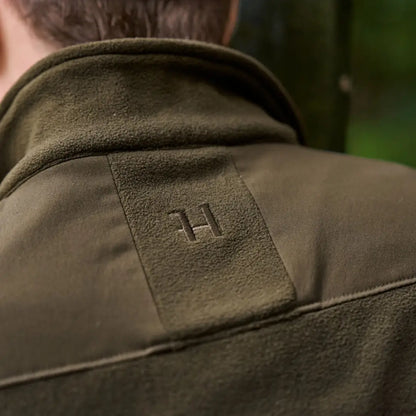 Olive green Härkila Fjell Fleece Waistcoat showcasing cozy fleece waistcoat style