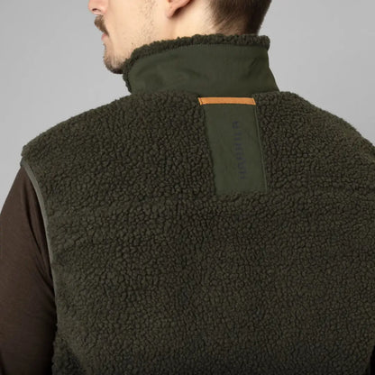 Green fleece vest from Härkila Fjell Polar Waistcoat, perfect for outdoor adventures