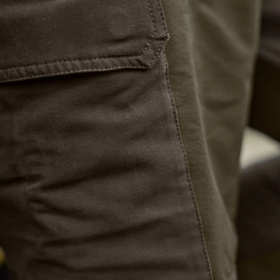 Brown cargo pocket on Härkila Hill Trousers for hunting and country clothing