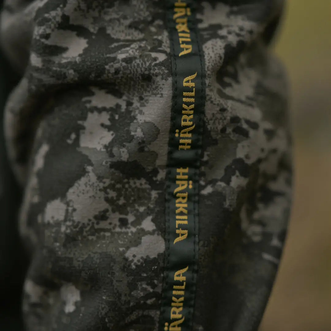 Camouflage hunting apparel with brand label, Härkila Kamko NOCTYX WSP reversible fleece jacket