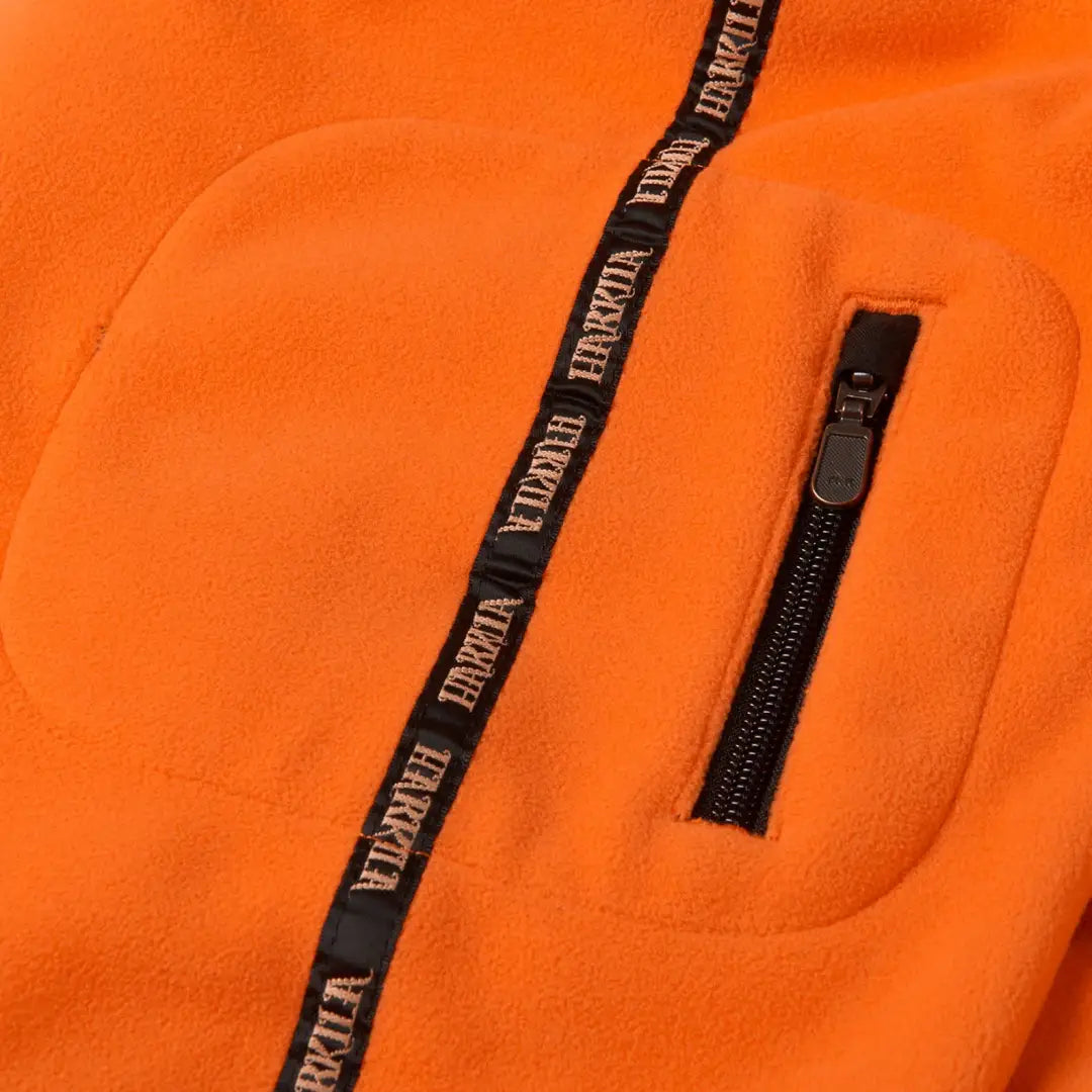 Orange fleece jacket with zippered pocket from Härkila Kamko Reversible Fleece Jacket for hunting or country clothing