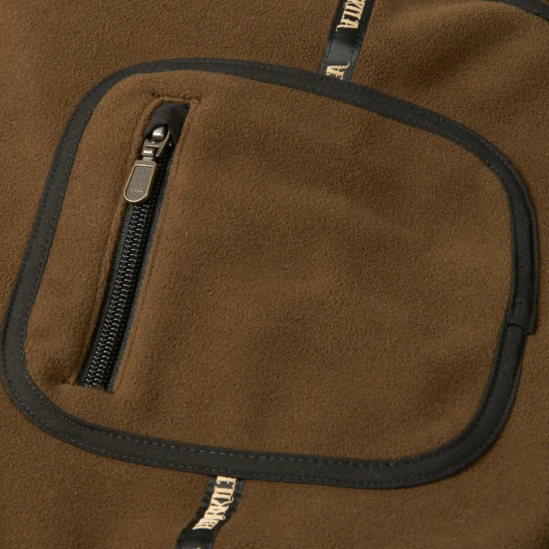 Brown fleece jacket pocket with zipper on Härkila Kamko Reversible Fleece Jacket for hunting and country clothing