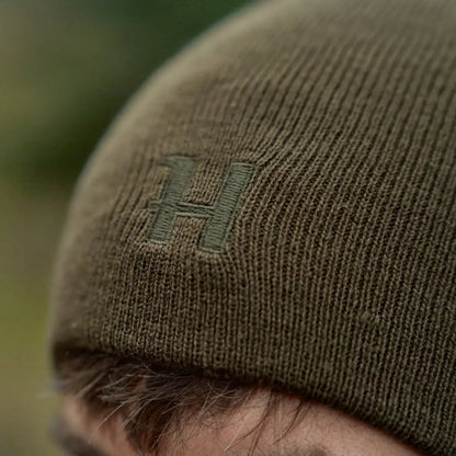 Olive green knit beanie with embroidered H Härkila Reversible Beanie for country clothing