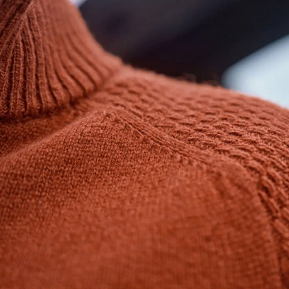 Rust-colored knit turtleneck sweater from Härkila Vincent Merino Half Zip Pullover collection