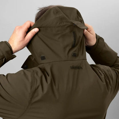 Olive green Harkila Orton Tech HWS Jacket being adjusted, perfect classic hunting jacket