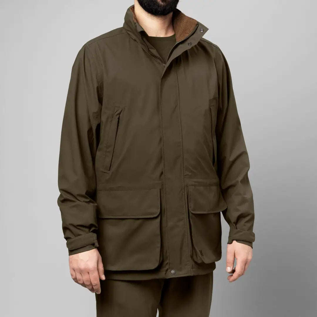 Olive green Harkila Orton Tech HWS classic hunting jacket with pockets and high collar