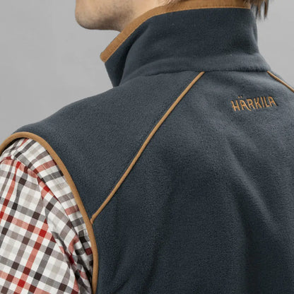 Dark blue Harkila Sandhem waistcoat with tan trim, perfect for country clothing and hunting