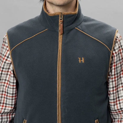 Dark gray Harkila Sandhem Waistcoat with tan trim, perfect for country clothing and hunting