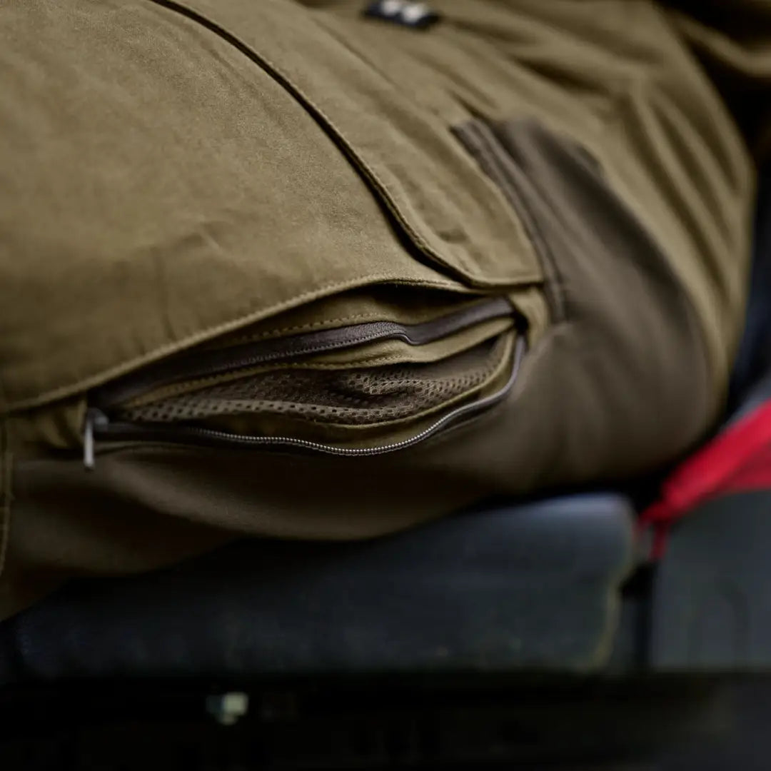 Olive green jacket with zippered pocket from Harkila Scandinavian Trousers collection