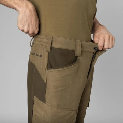 Olive green Härkila Scandinavian Trousers perfect for hunting adventures