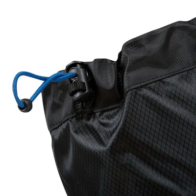 Black backpack with blue carabiner, perfect for country clothing and outdoor adventures