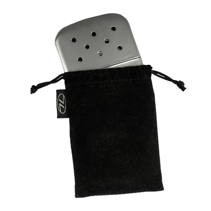 Metal hand warmer in a black drawstring bag for the Highlander Pocket Furnace