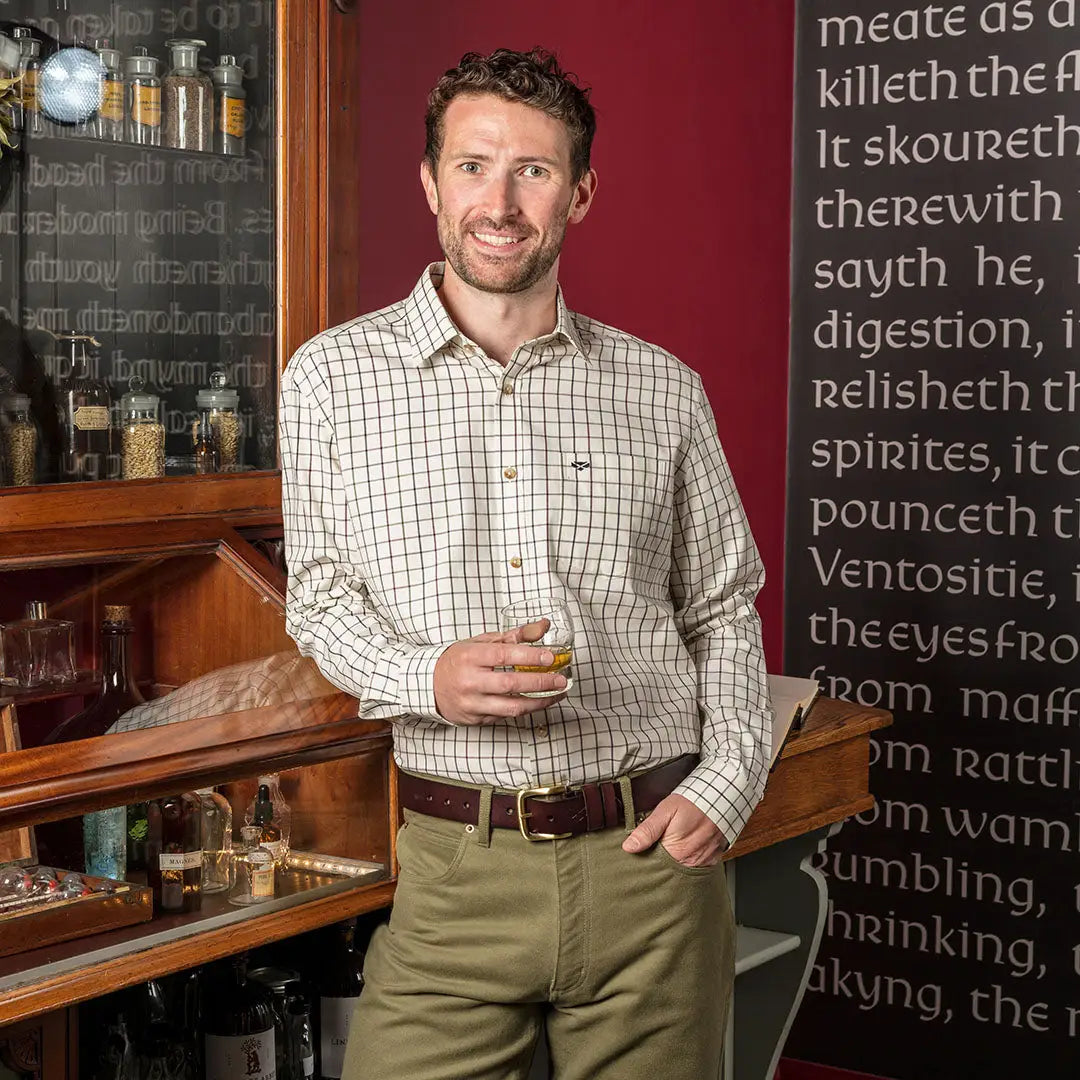 Smiling man in a Hoggs Of Fife Balmoral Tattersall Shirt with sophisticated colour combos
