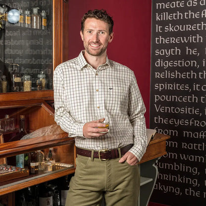Smiling man in a Hoggs Of Fife Balmoral Tattersall Shirt with sophisticated colour combos