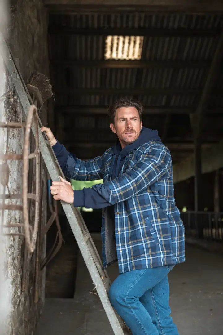 Blue plaid flannel shirt with denim pants and green undershirt, Hoggs of Fife Brunton Sherpa lined shacket
