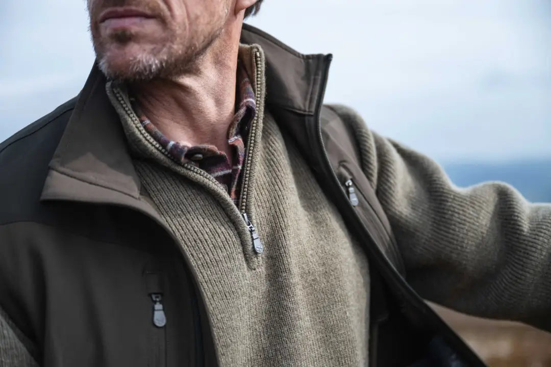 Olive green wool zip neck windproof pullover with pocket detail from Hoggs Of Fife