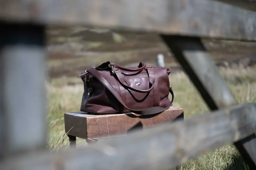 Brown leather Hoggs of Fife Monarch Carryon Holdall with silver hardware for country clothing and outdoor adventures