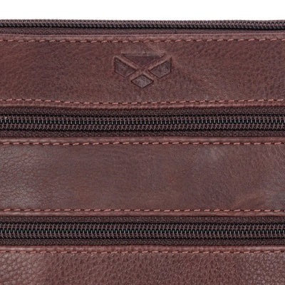 Brown Monarch Leather Travel Organiser with three zippers and embossed logo